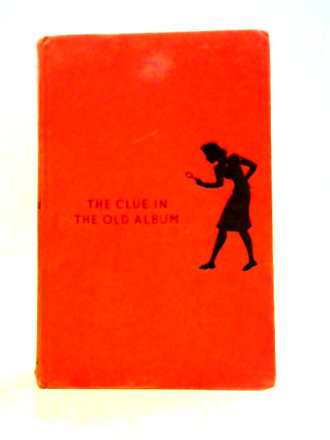 The Clue In The Old Album By Carolyn Keene